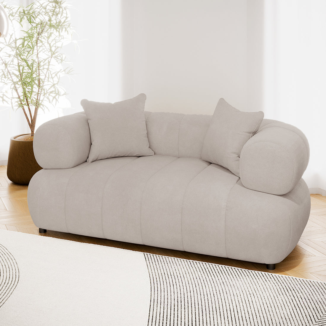 Samira 2 Seater Velvet Sofa in Warm Beige, showcasing plush velvet upholstery, two matching pillows, and a solid wood frame, perfect for modern elegance and comfort in any living space.