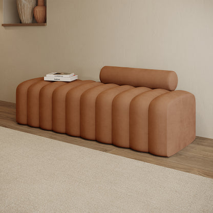 Sasa Velvet Tufted Fabric Bench with Backrest Burnt Orange, featuring rounded ribbed sections, cylindrical bolster, and two books. Bench set against light wood floor and textured off-white wall.