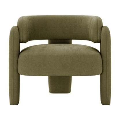 Seto Velvet Curved Occasional Accent Chair – Sage, featuring an olive-green upholstery, low padded seat, tubular wrap-around cushion backrest, and a unique pedestal and cylindrical leg design for a minimalist look.