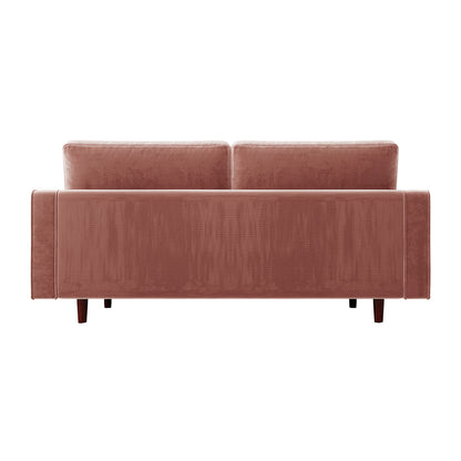 Sollia 3-Seater Velvet Sofa in Blush, showcasing plush velvet upholstery and elegant design, perfect for modern interiors. Features sleek wooden feet and matching bolster pillows for a sophisticated look.