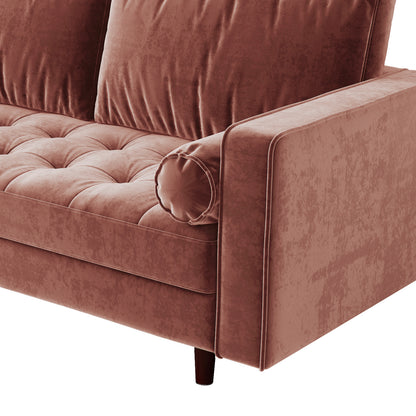 Sollia 3-Seater Velvet Sofa - Blush: Close-up of plush velvet upholstery, fixed cushions, and wooden armrest, showcasing elegant craftsmanship and luxurious design.