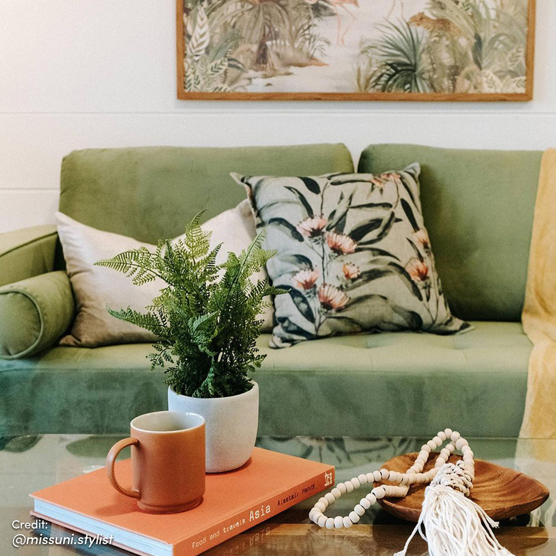 Sollia 3-Seater Velvet Sofa in jade green, featuring luxurious velvet upholstery, sleek modern design, and comfortable seating for three with matching bolster pillows and stylish wooden feet.