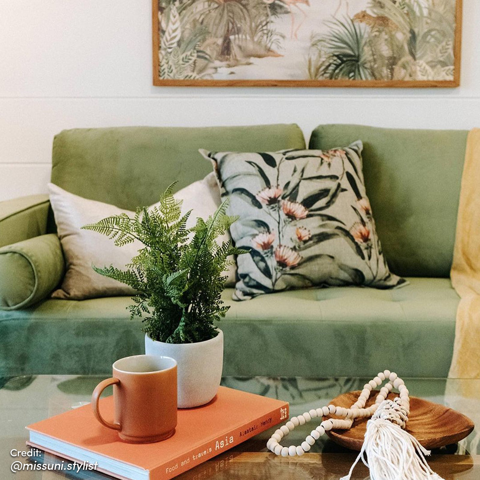 Sollia 3-Seater Velvet Sofa in jade green, featuring luxurious velvet upholstery, sleek modern design, and comfortable seating for three with matching bolster pillows and stylish wooden feet.