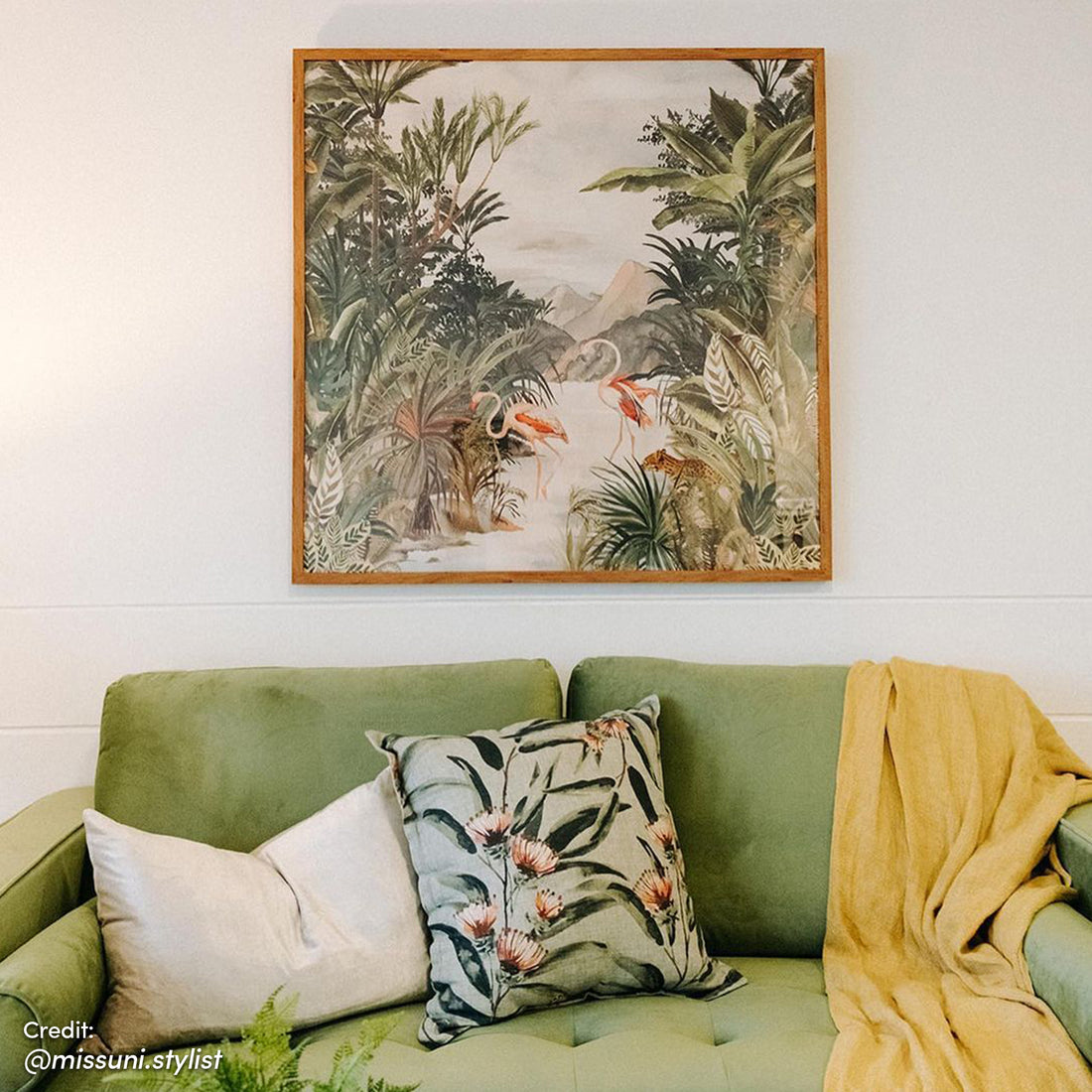 Sollia 3-Seater Velvet Sofa in jade green, featuring plush velvet upholstery, sleek modern design, and matching bolster pillows, positioned within a stylish indoor setting.