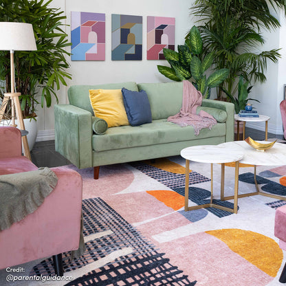 Sollia 3-Seater Velvet Sofa - Jade Green, featuring luxurious velvet upholstery and a modern design, with matching round bolster pillows on a studio couch setting, enhancing interior elegance and comfort.