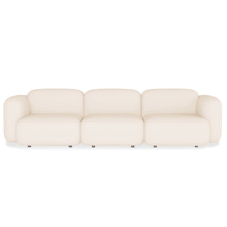 Soraya 3 Seater Modular Velvet Sofa Set with plush velvet upholstery, featuring a sleek, low-rise design, black legs, and prominent armrests, highlighting its modern, modular configuration for versatile living room arrangements.