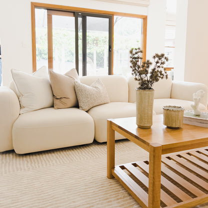 Close-up of a white pillow on the Soraya 3 Seater Modular Velvet Sofa Set, showcasing the plush velvet upholstery and modern design of this cream white sofa set.
