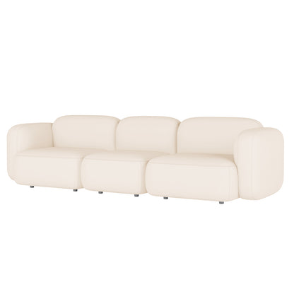 Soraya 3 Seater Velvet Sectional Sofa in Cream White features a sleek, low-profile design with three modular sections and plush cushions, resting on discreet black feet, enhancing any modern living space.