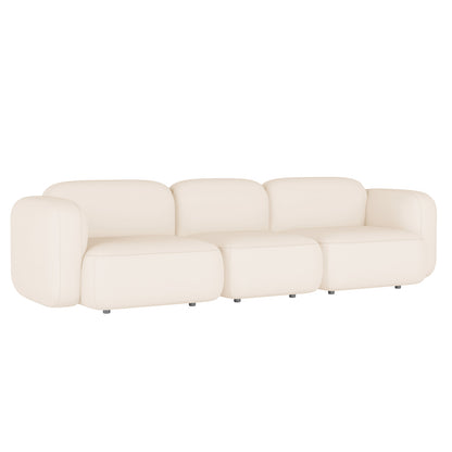 Soraya 3 Seater Velvet Sectional Sofa in Cream White features a modern, low-profile design with modular seating and softly rounded cushions, complemented by short cylindrical legs, offering both style and comfort.