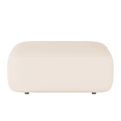 Soraya 3-Seater Velvet Sectional Sofa in Cream White, featuring a low rectangular ottoman with rounded corners, upholstered in light beige fabric, and supported by dark stub-style legs for a sleek, modern look.