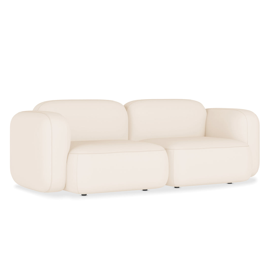 Soraya 2 Seater Velvet Sectional Sofa in Cream White with oversized, rounded cushions and nearly invisible legs, showcasing a modern, low-profile design in plush velvet fabric for stylish, customizable seating.
