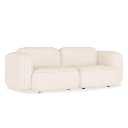 Soraya 2 Seater Velvet Sectional Sofa in Cream White with oversized, rounded cushions and nearly invisible legs, showcasing a modern, low-profile design in plush velvet fabric for stylish, customizable seating.