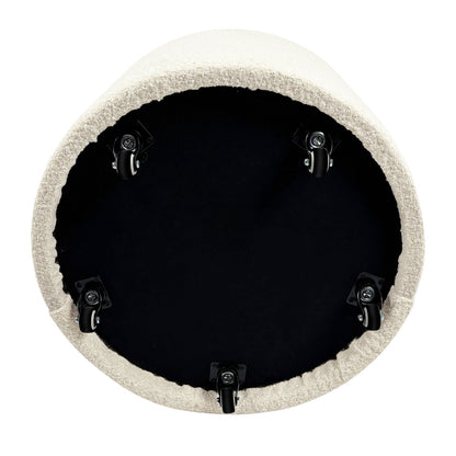 Sorra Boucle Swivel Storage Accent Chair underside with five swivel caster wheels on a black base, upholstered edge in light fabric, designed for easy mobility and hidden storage.