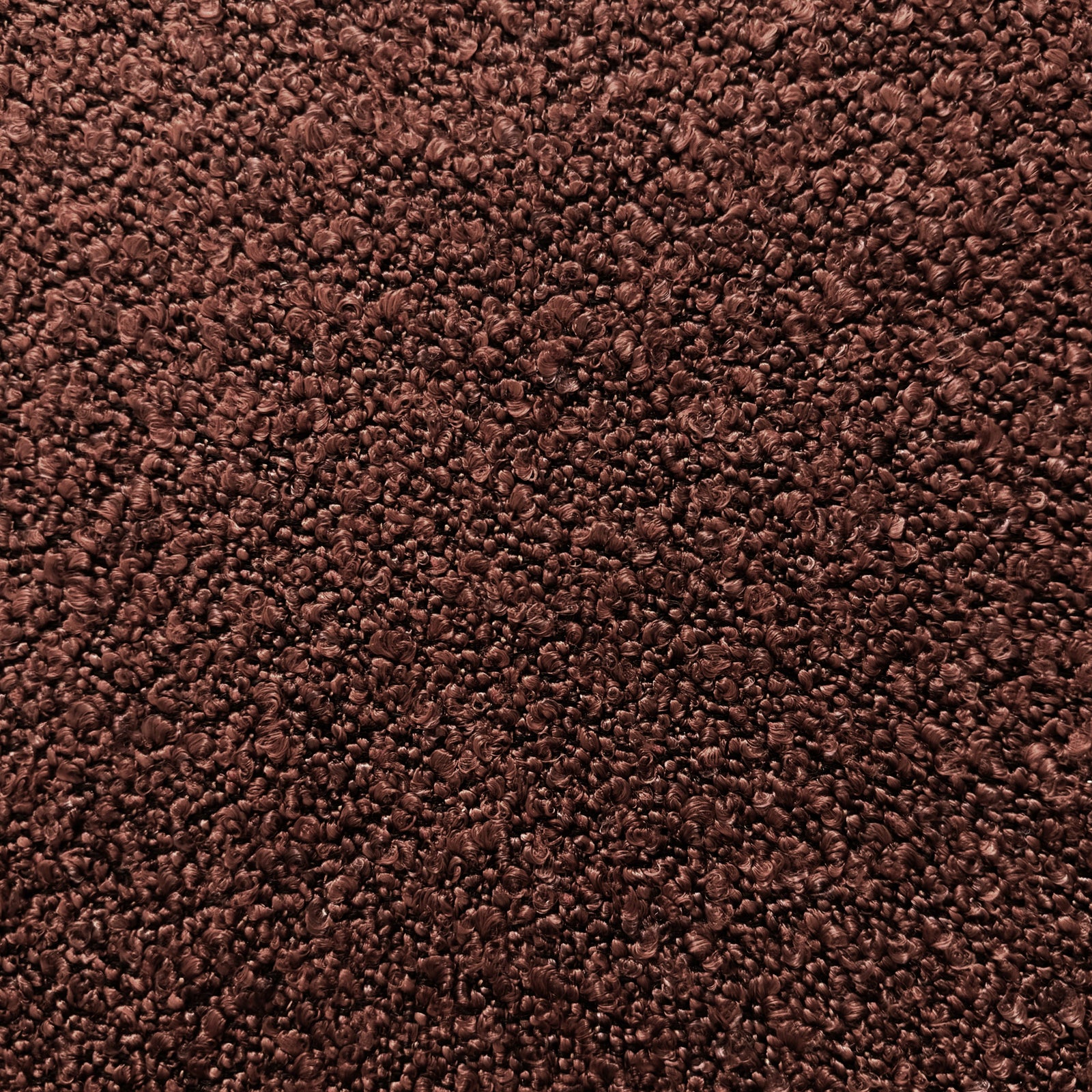 Close-up of Sorra Boucle Swivel Storage Accent Chair in Rust Brown, showcasing plush loop-pile bouclé fabric texture, highlighting its inviting and cozy appeal.