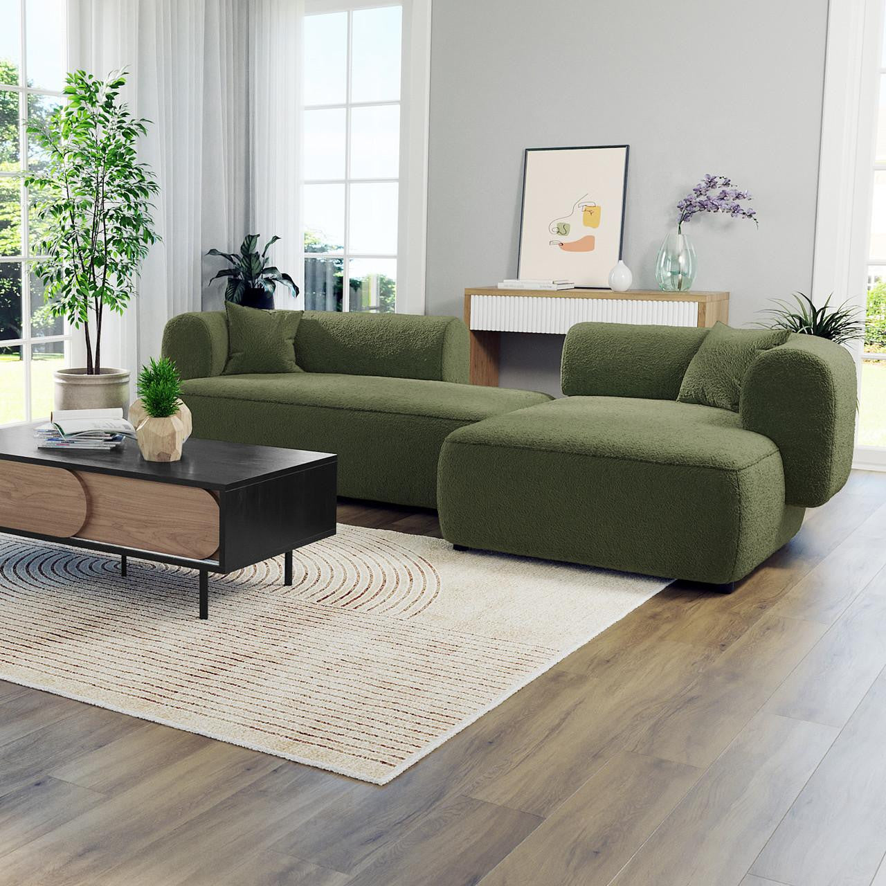 Susie 4-Seater Boucle L-Shaped Sofa in front of a window, showcasing its ergonomic curved backrest and plush upholstery, enhancing the modern living room's elegance and comfort.