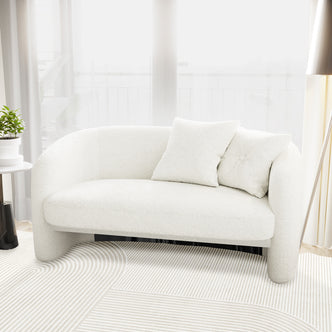 Tasha Boucle 2 Seater Sofa Cream White, featuring sleek, curvy lines and plush boucle upholstery, sits invitingly in an elegant indoor setting, exuding luxury and modernity.