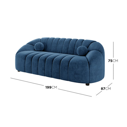 Trina 3 Seater Tufted Velvet Sofa in Blue features a curved design with channel tufting, deep blue upholstery, matching bolster pillows, and rests on black cylindrical legs, dimensions 199cm x 87cm x 75cm.