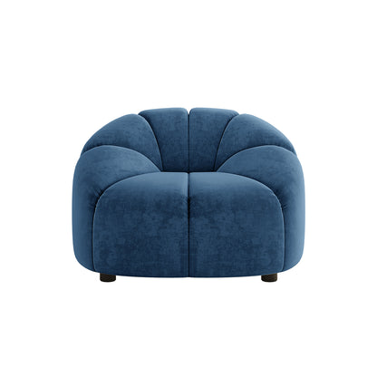 Trina Velvet 5-Seater Tufted Lounge Set features a close-up of plush velvet upholstery, showcasing its channel tufting and curved silhouette with black-legged chairs, highlighting modern elegance and comfort.