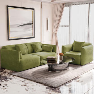 Vestalia 4 Seater Velvet Sofa Set in Olive Green features a sleek, low-profile design in a bright living room, paired with a matching armchair and a stylish round glass coffee table.