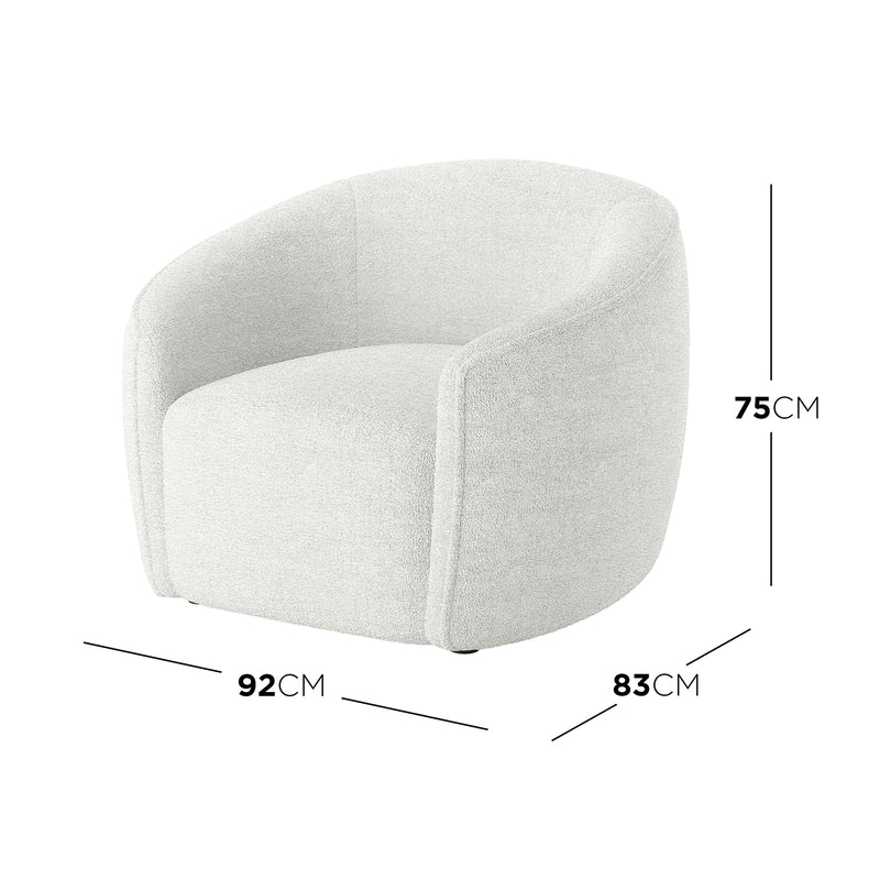 Yara Bouclé Accent Chair in Cream White, featuring a low-profile design with a continuous curved back and armrest, upholstered in textured bouclé fabric. Dimensions: 92 cm wide, 83 cm deep, 75 cm tall.