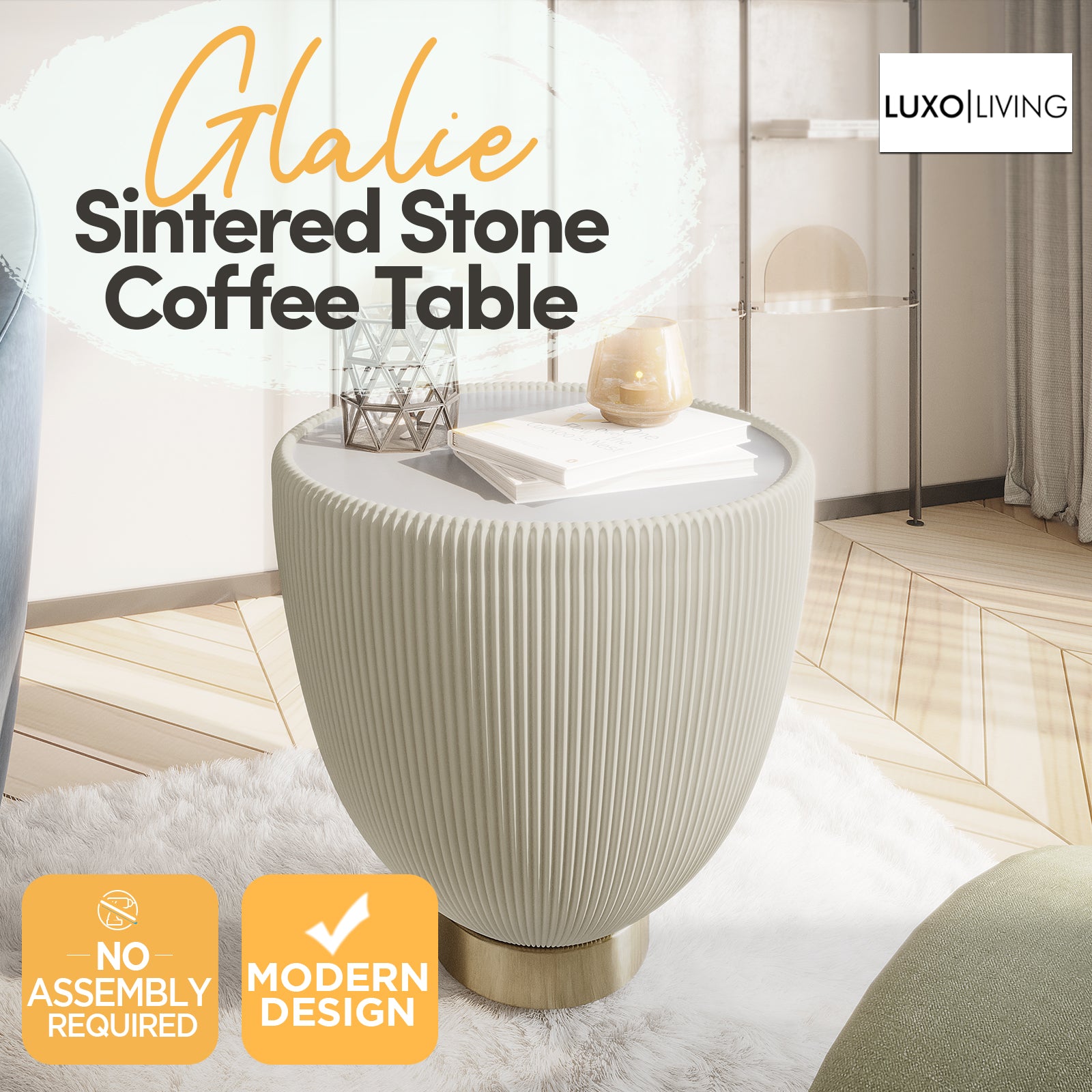 Glalie Sintered Stone Coffee Table Set in Cream White features a round, pleated tabletop on a gold-tone base, styled with décor items on a fluffy rug in a minimal living room.