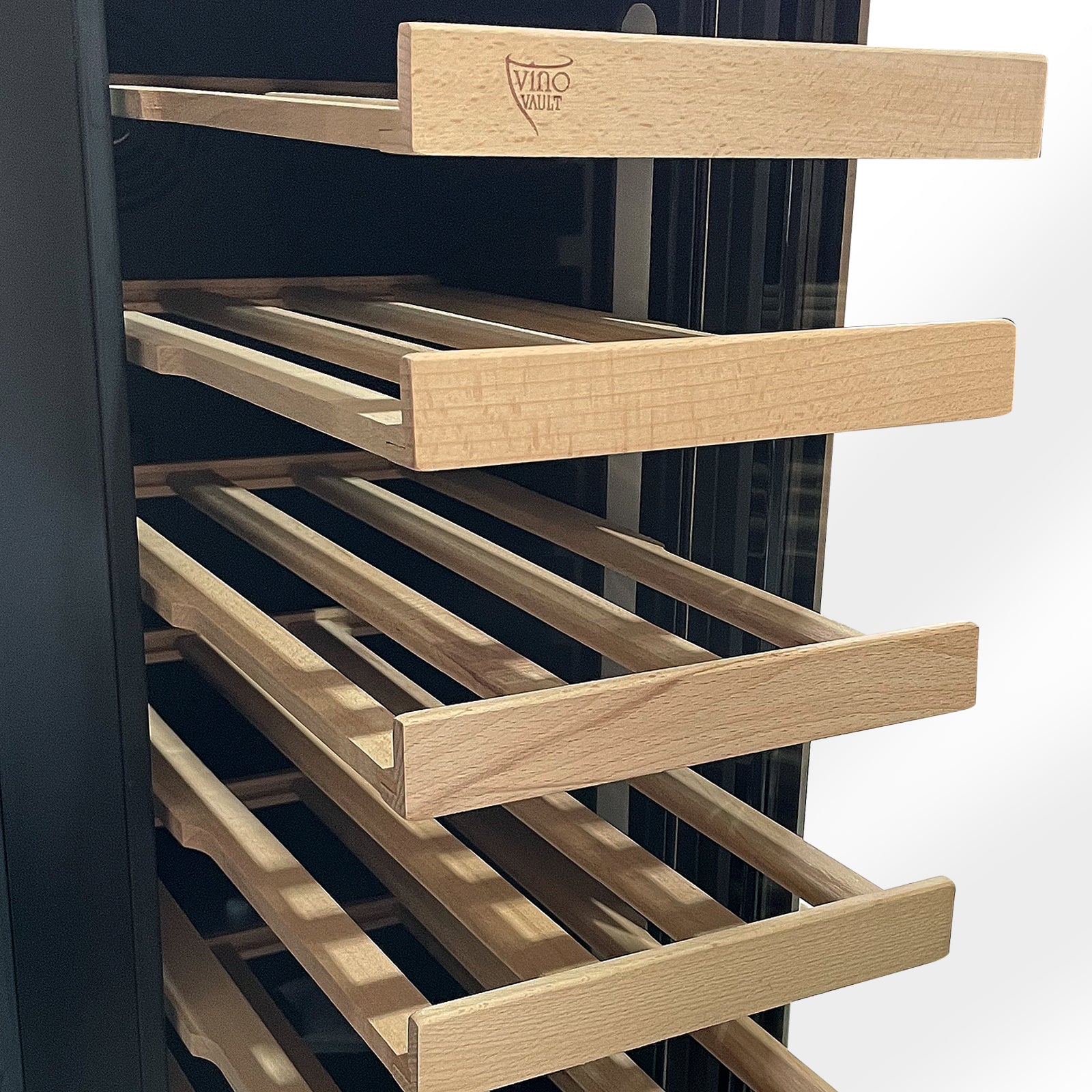 VinoVault H140D 140L Dual Zone Wine Fridge features empty pull-out wooden bottle racks, showcasing its spacious design ideal for organized storage of wine bottles and drinks.