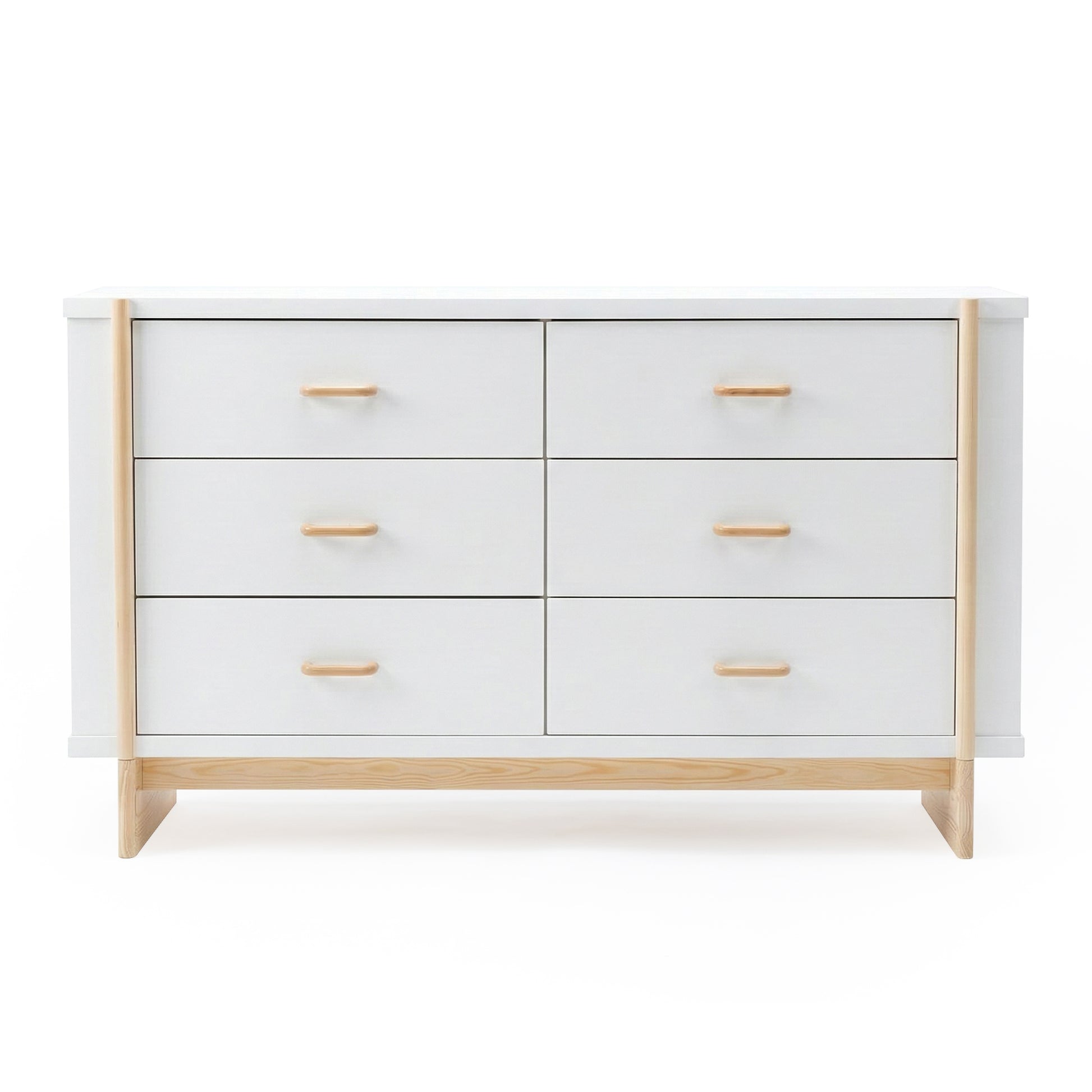 Minimalist six-drawer dresser with white finish and light wood accents on a white background