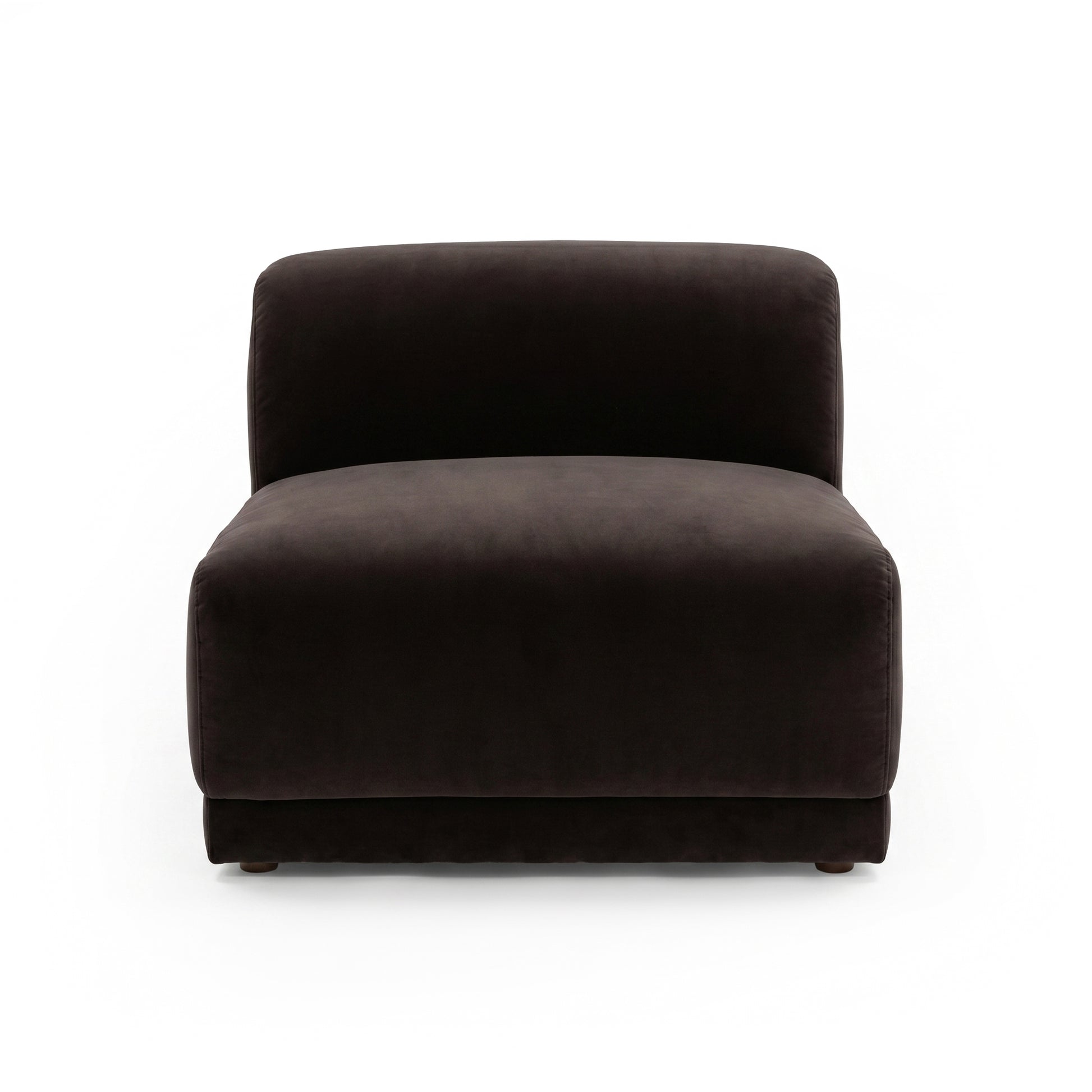Dark velvet armless accent chair on white background