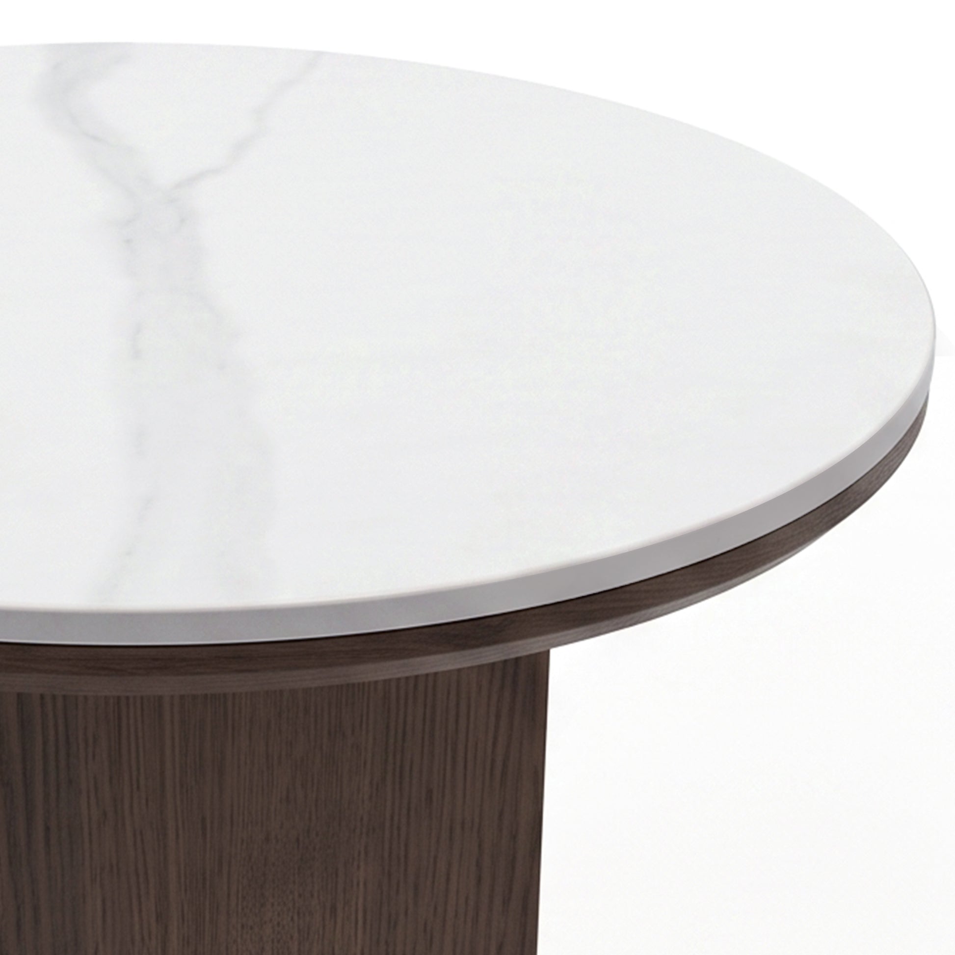 Close-up partial view of a round table with marble top and dark wood base on white background