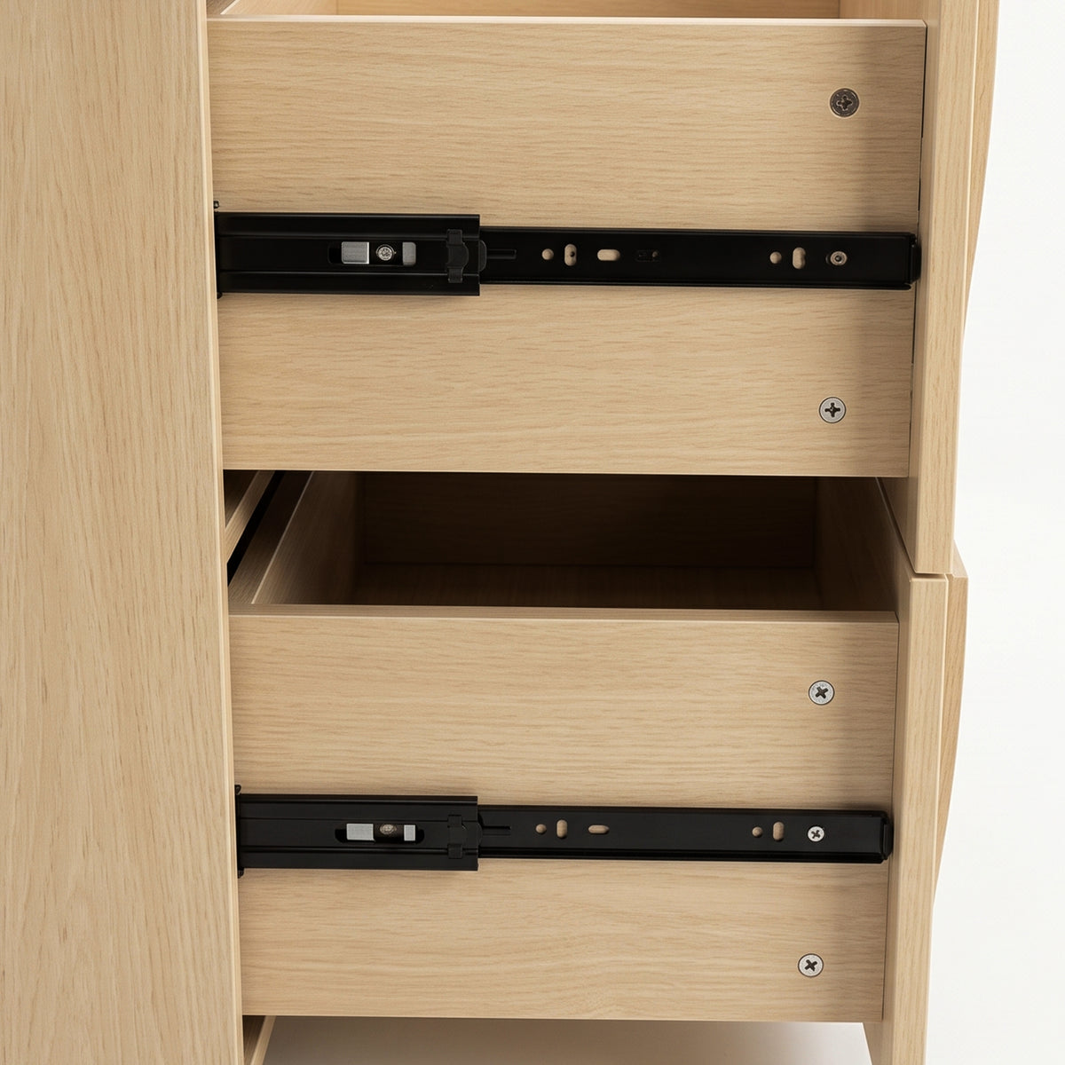 Close-up of wooden drawers with exposed metal slide mechanisms