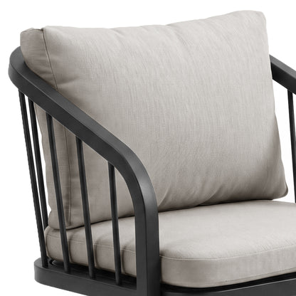 Close-up of chair arm and cushions on white background