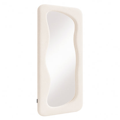 Sabrina 180cm Curved Full Length Mirror in Beige features an organic-shaped reflective surface set in a soft-textured, off-white padded frame, perfect for enhancing modern interiors with elegance and practicality.