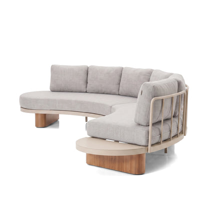 Contemporary light gray sectional sofa with built-in round side table on a white background.