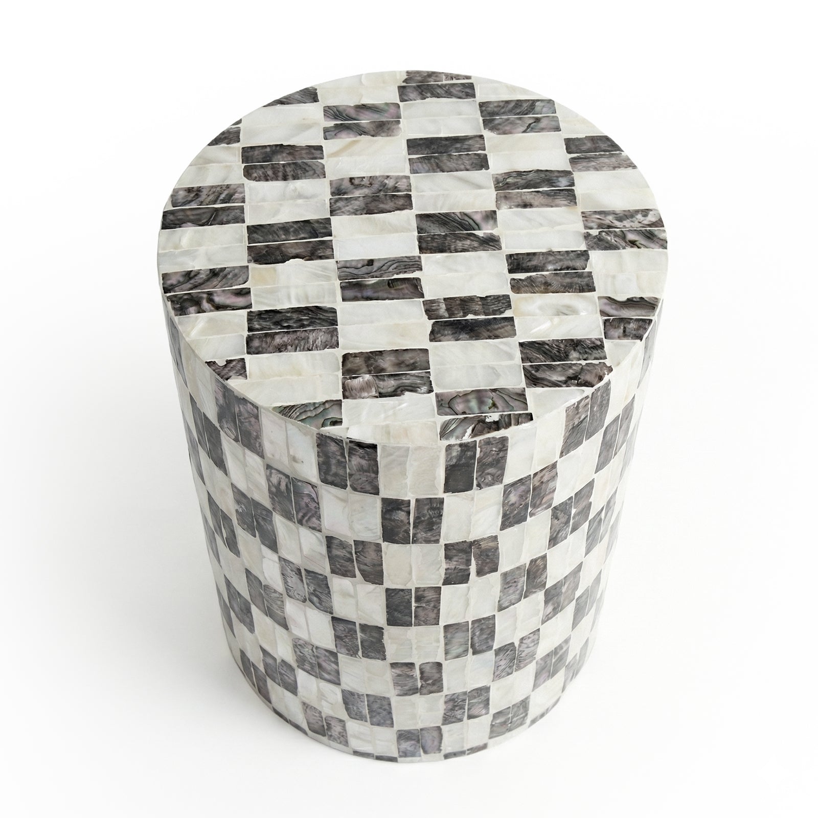 Black and white checkered cylindrical side table on white background