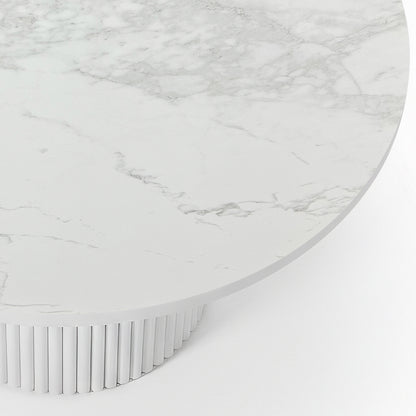 Evone Aluminium Outdoor Dining Table in White featuring a round marble-look surface with subtle gray veining, atop a cylindrical, vertically fluted base, embodying a modern, minimalist design.