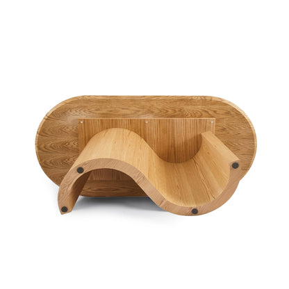 Sculpted wooden bench or chair with wave-like seat on white background