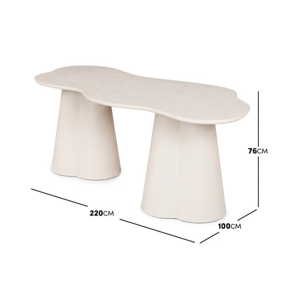 Organic-shaped dining table on a white background with dimension lines showing 220cm by 100cm by 76cm