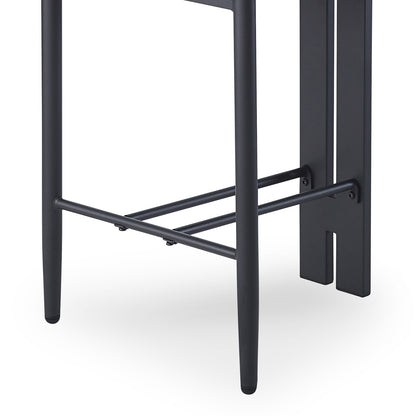 Close-up of the Haleo Curved Boucle Fabric Barstool Set of 2, showcasing two slender, round metal legs with horizontal cross bars, emphasizing the barstool's sleek, sturdy base design.