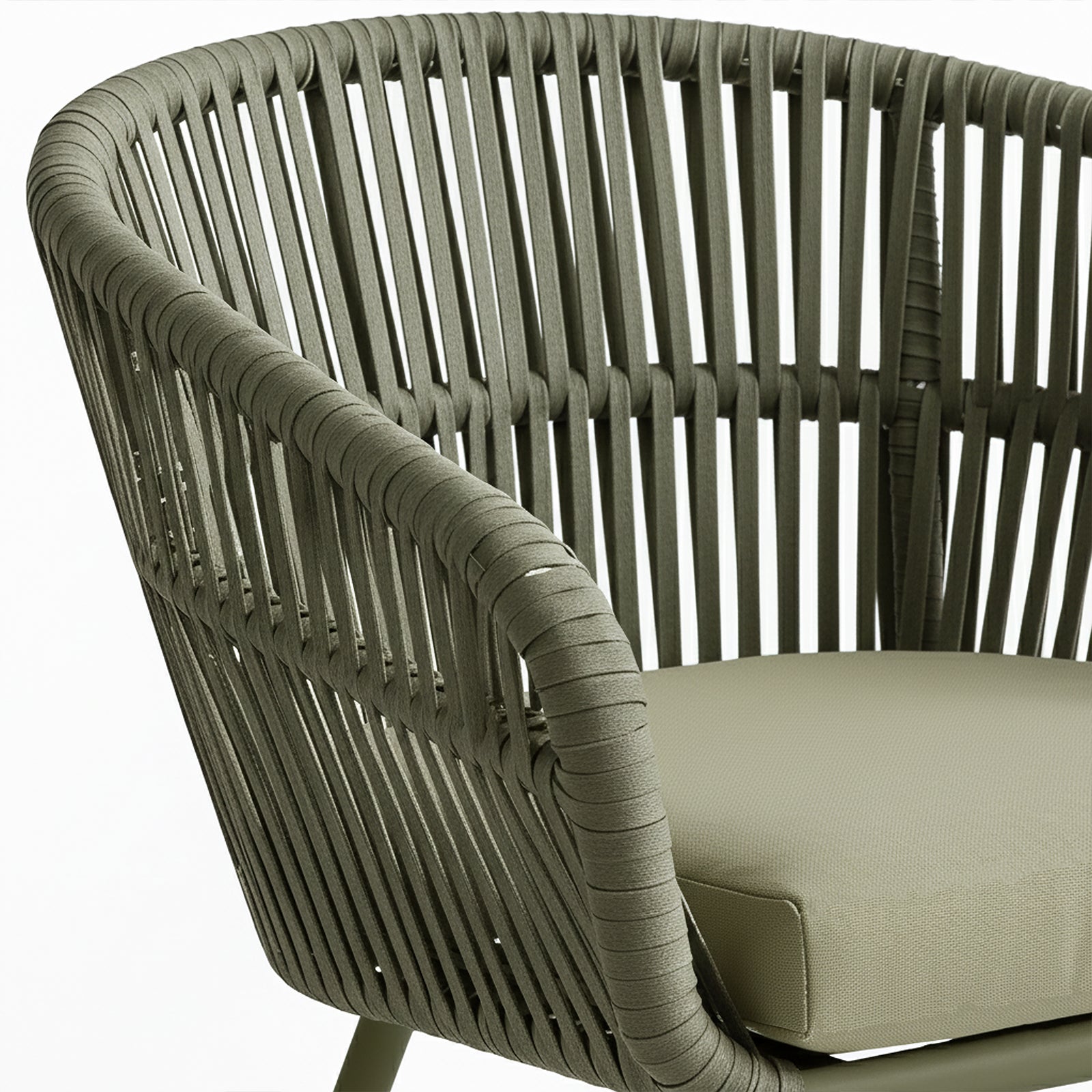 Close-up of Marula Rope Outdoor Dining Chairs in Green Set of 4, featuring a woven-rope frame, tubular cords, and a rectangular seat cushion, ideal for modern indoor/outdoor settings.