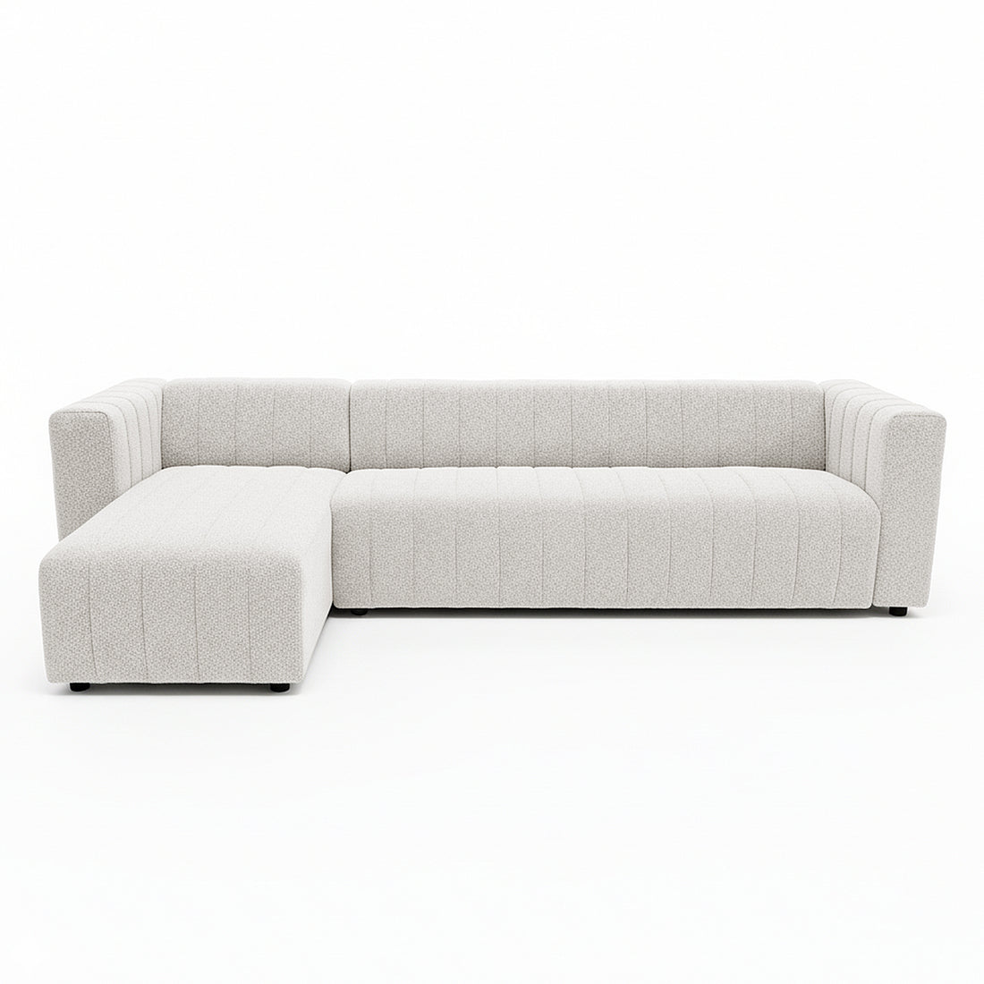 Parisa 4 Seater Tufted Boucle Sofa with Chaise in Cream White, featuring a modern L-shape, channel tufting, and low feet, offers a spacious chaise for lounging in style.