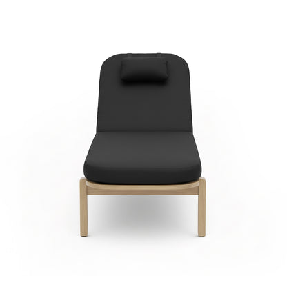 Zyra Hardwood Reclining Sun Lounger with Cushion in Black featuring a light wood frame, thick upholstered cushion, and attached head-pillow, showcasing its modern design and functional reclining backrest.