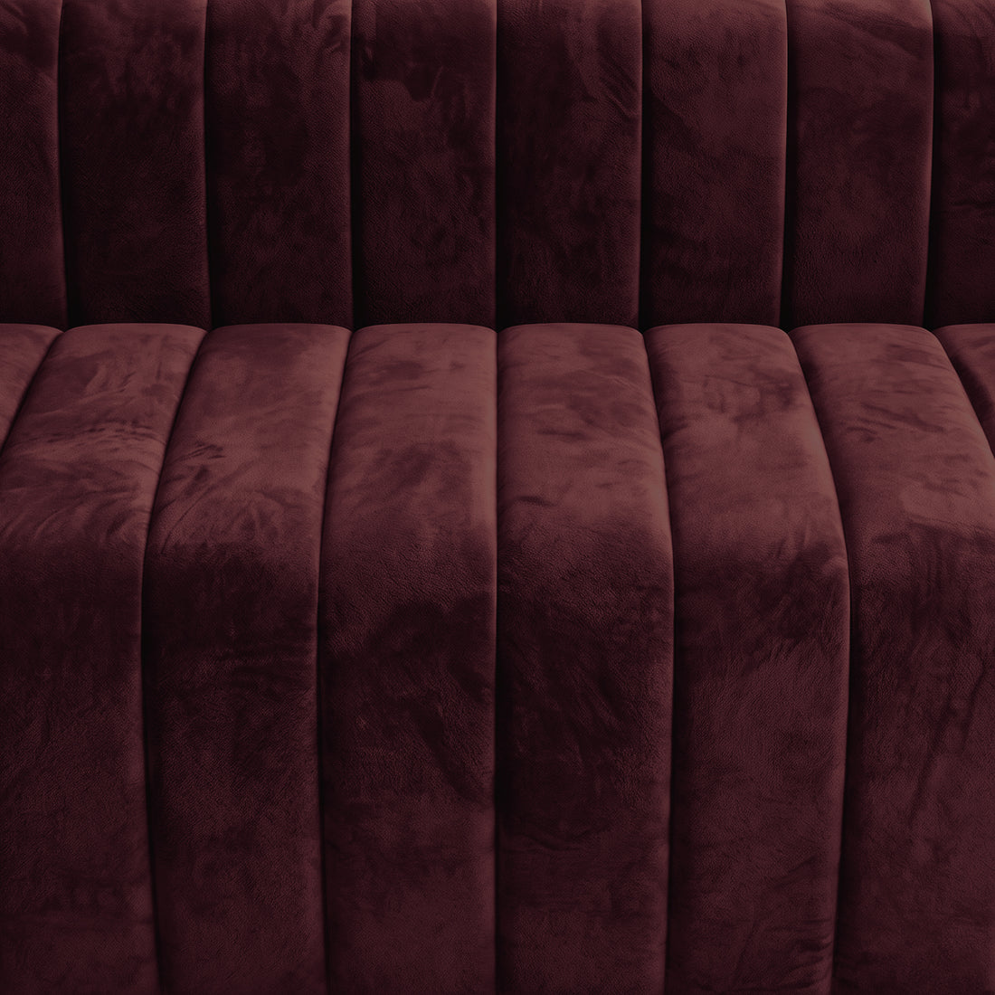 Close-up of Dark Merlot tufted upholstery texture