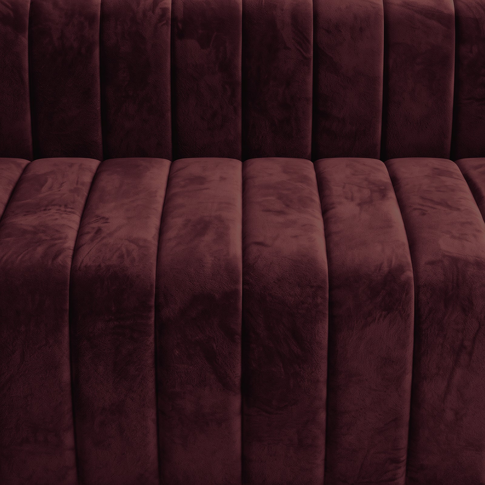 Close-up of Dark Merlot tufted upholstery texture