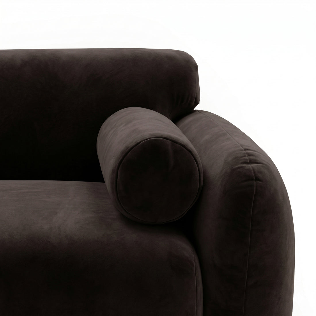 Close-up of dark brown sofa armrest and cushion detail on white background