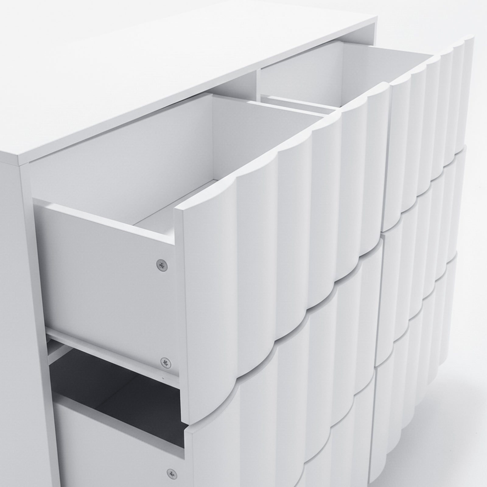Close-up of upper portion of white wave-textured dresser with drawers on white background