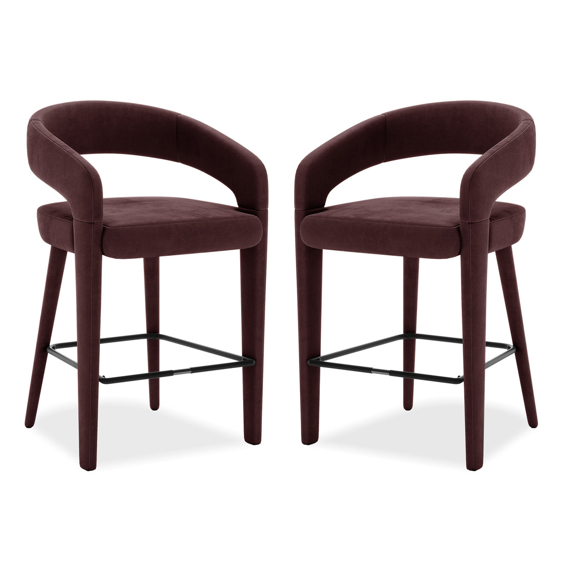 Eisha Velvet Bar Stool Set of 2 in Dark Plum features curved tubular backrests, padded seats, and tapered legs with a black metal footrest, designed for kitchen islands or home bars.