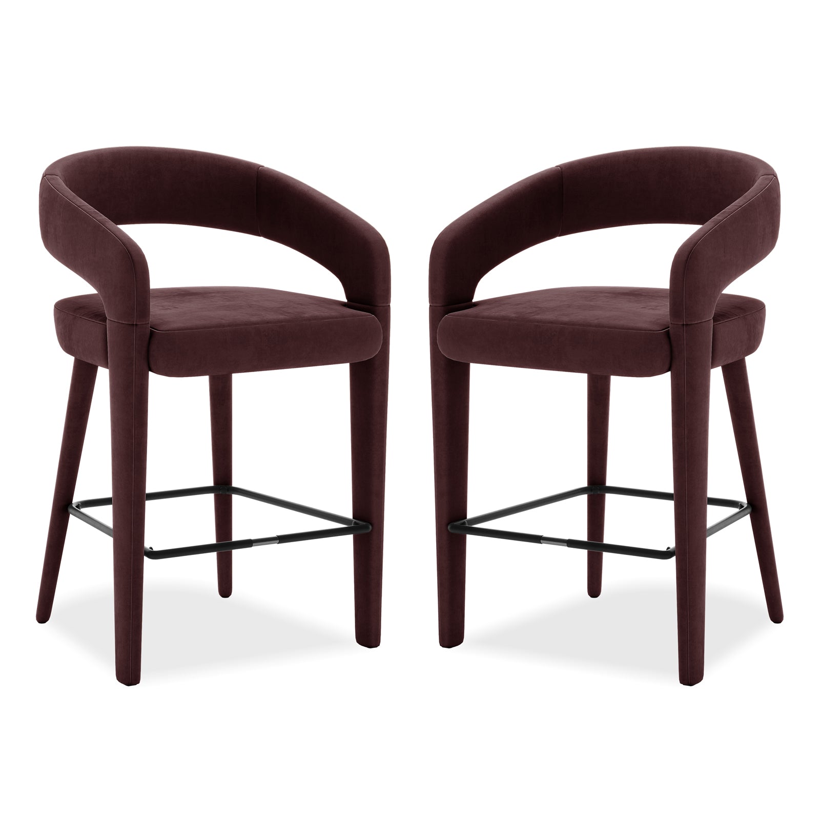 Eisha Velvet Bar Stool Set of 2 in Dark Plum features curved tubular backrests, padded seats, and tapered legs with a black metal footrest, designed for kitchen islands or home bars.