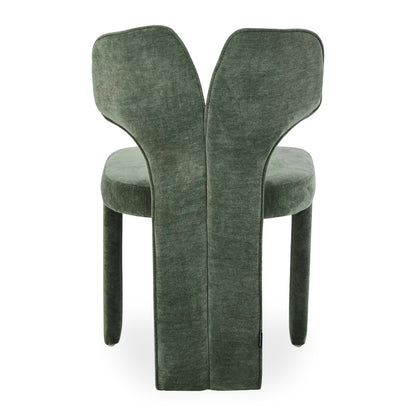 Rear view of green sculptural chair on white background