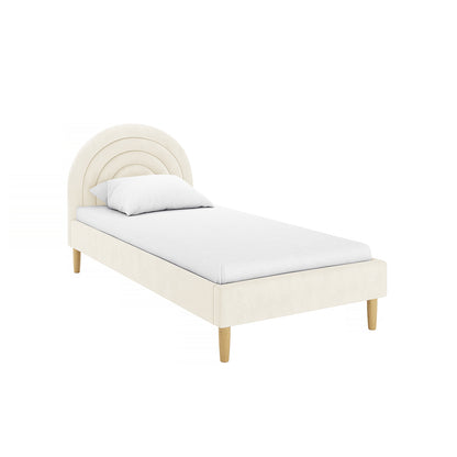 Estilla Velvet Rainbow Bed in Beige features a cream upholstered frame, arched headboard, and light wood legs, emphasizing its modern design and soft velvet texture for a cozy bedroom ambiance.