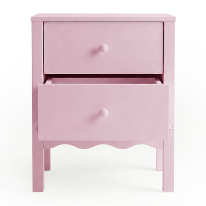 Pink two-drawer nightstand with lower drawer partially open on white background